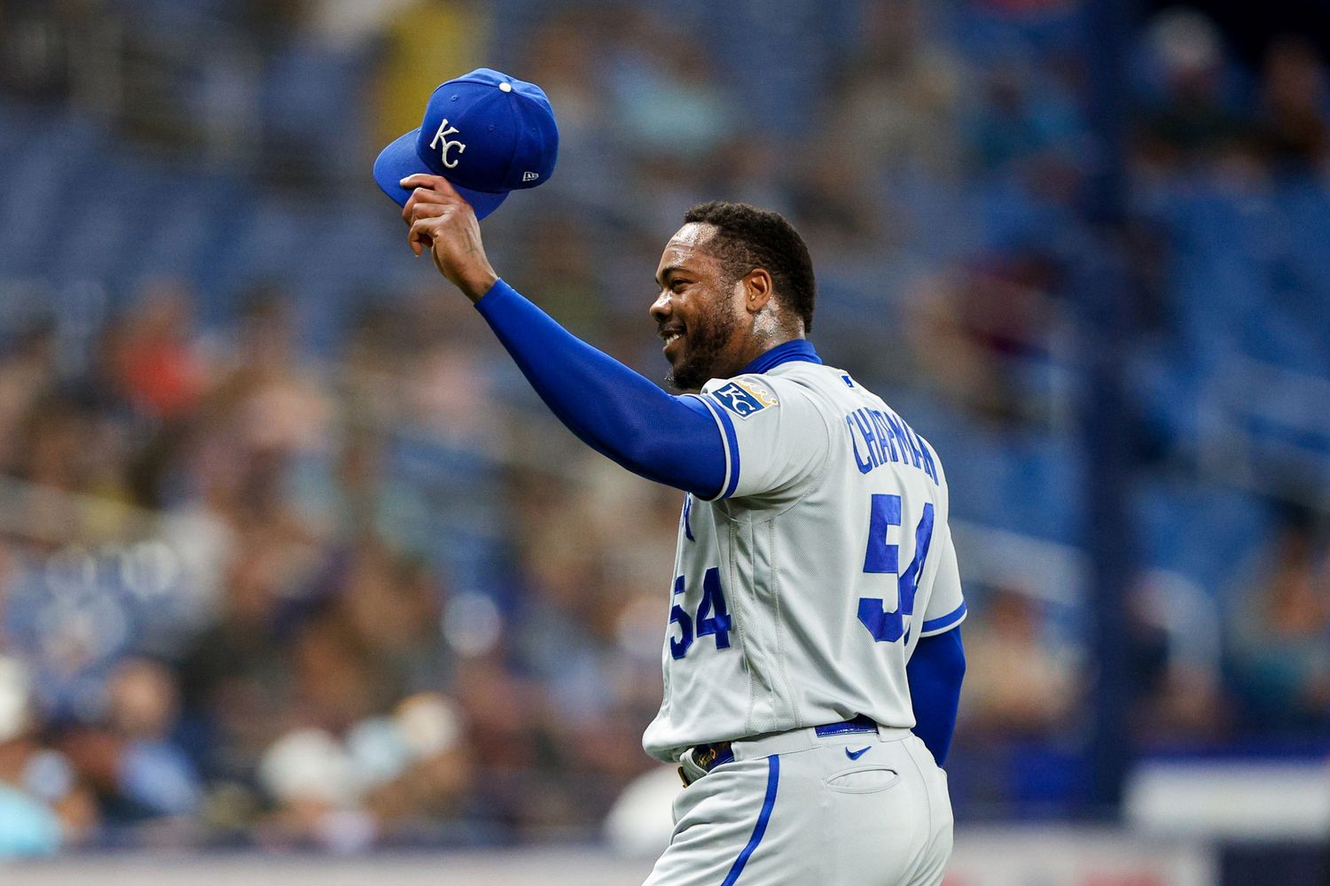 Jun 22, 2023; St. Petersburg, Florida, USA; Kansas City Royals relief pitcher Aroldis Chapman (54) walks off the field after pitching against the Tampa Bay Rays in the eighth inning at Tropicana Field. Mandatory Credit: Nathan Ray Seebeck-USA TODAY Sports